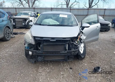 2014 Kia Rio Lx z USA, uszkodzony, nr VIN KNADM4A35E6324679